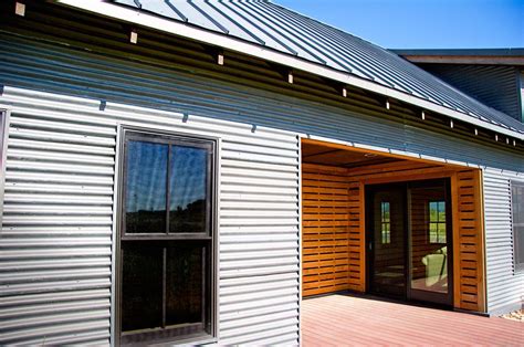 house with corrugated metal siding|installing corrugated metal siding.